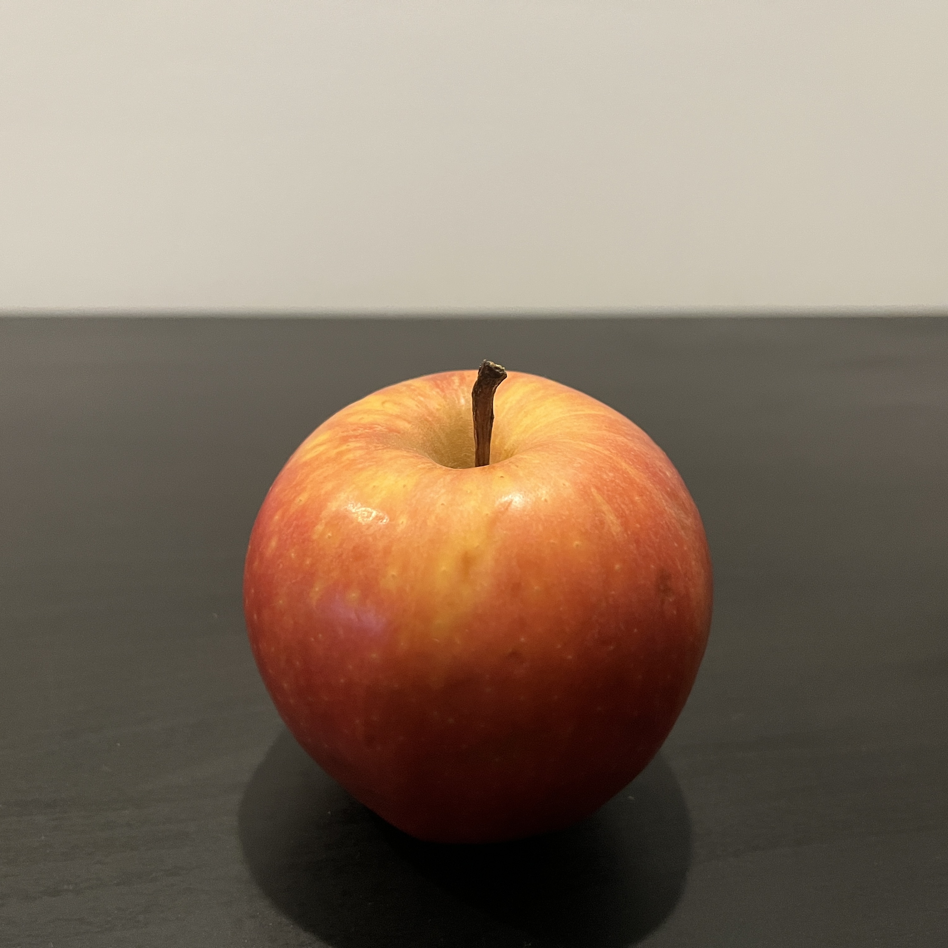 A red gala apple.